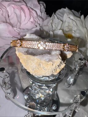 Gold plated Pave CZ’s Clover cuff bracelet.